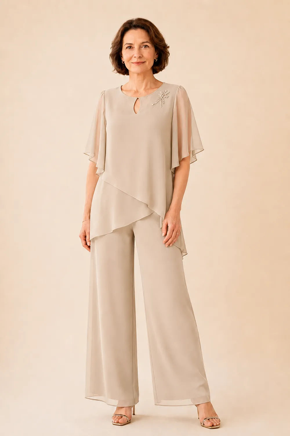 Annabel chiffon cape trouser suit in champagne, full-length front view