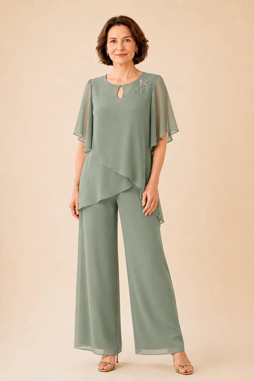 Annabel chiffon cape trouser suit in sage green, full-length front view