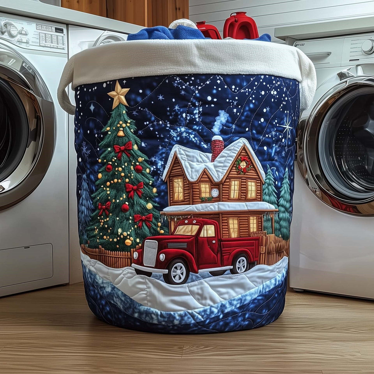 Gemma hand-quilted laundry basket with a vintage red truck, a lit house and a Christmas tree under a starry navy sky, front view