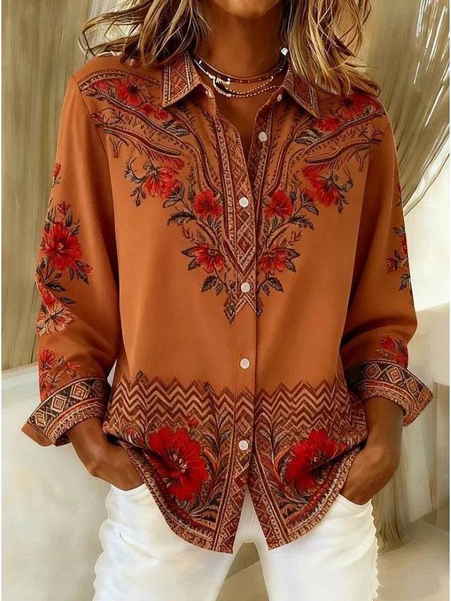 Dawnflora artistic floral blouse in terracotta with red floral and paisley print, front view