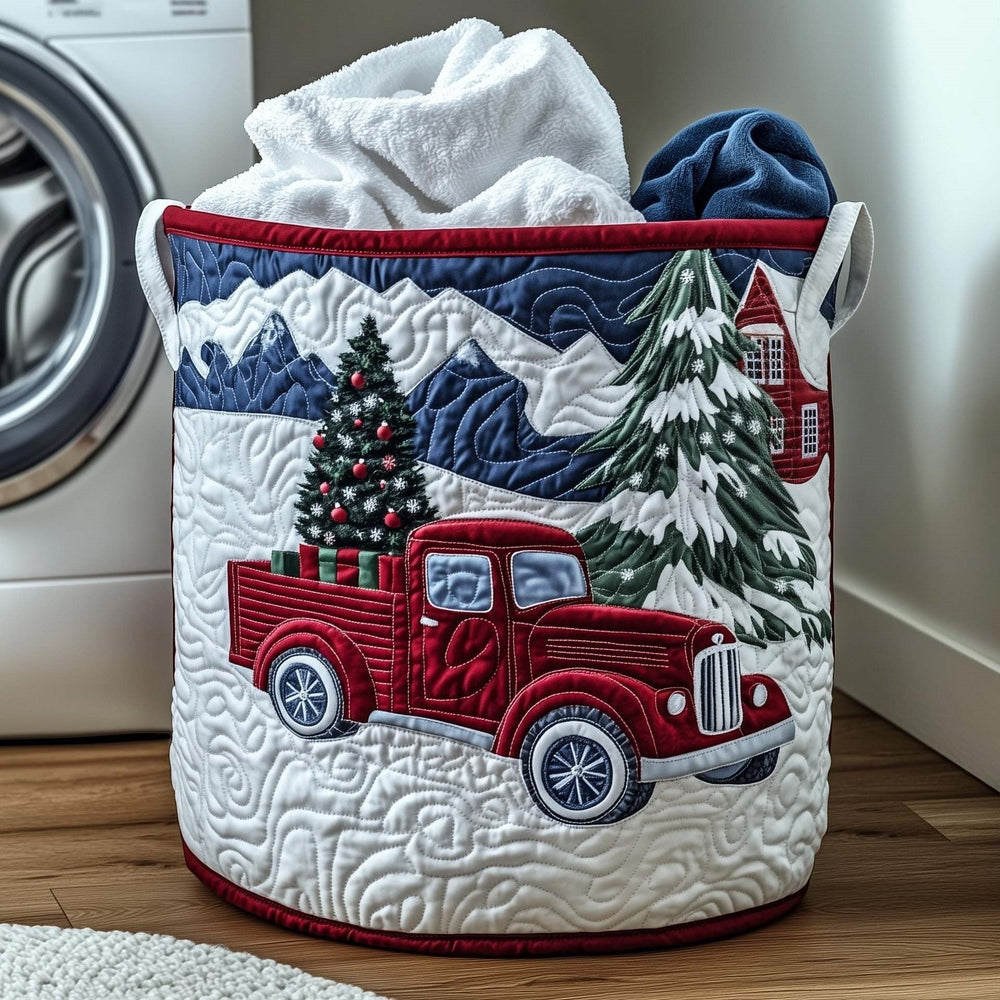 Gilda hand-quilted laundry basket with a red truck with a Christmas tree beside a wooden cabin, front view