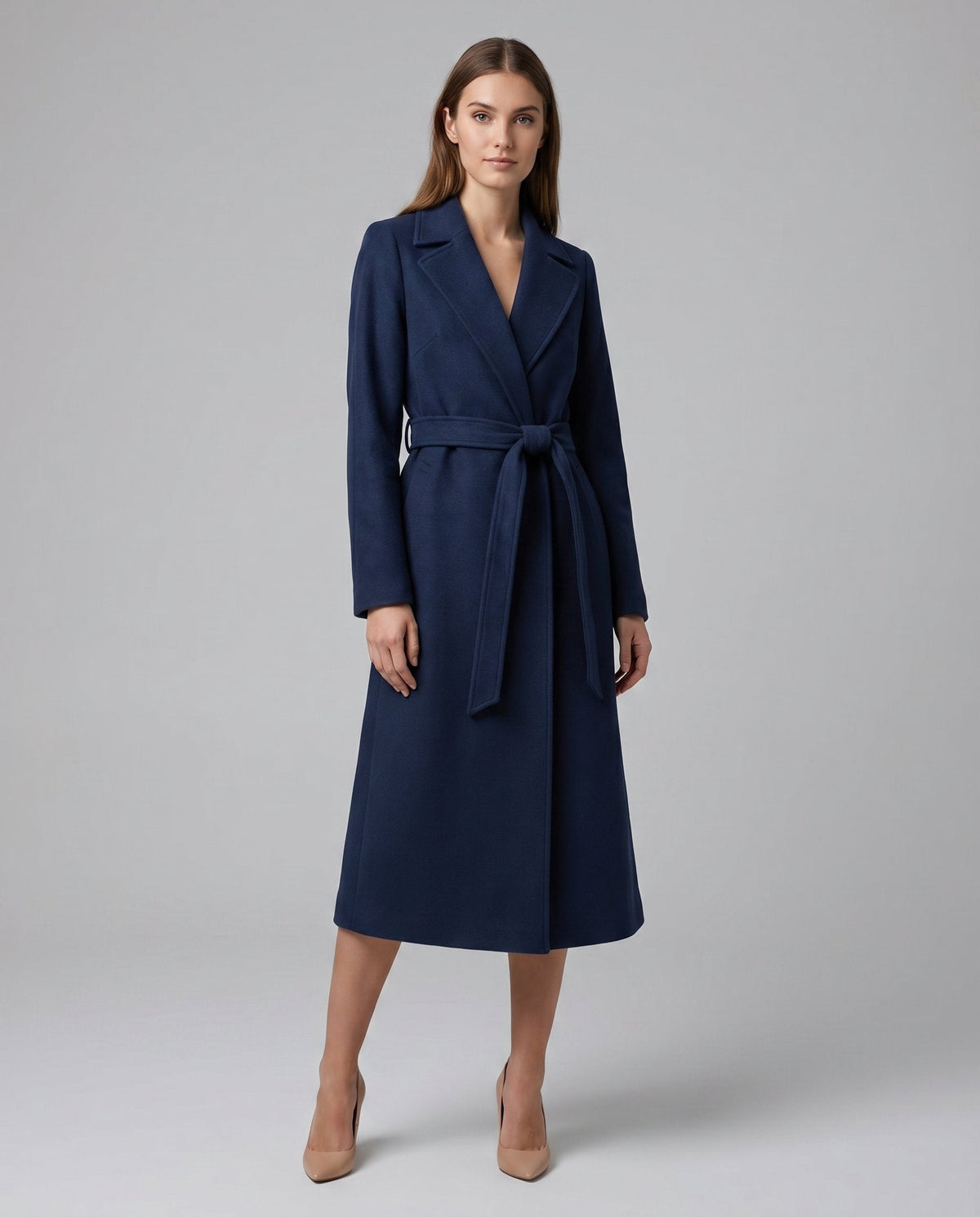 Josie long belted lapel coat in navy, front view with tie belt fastened