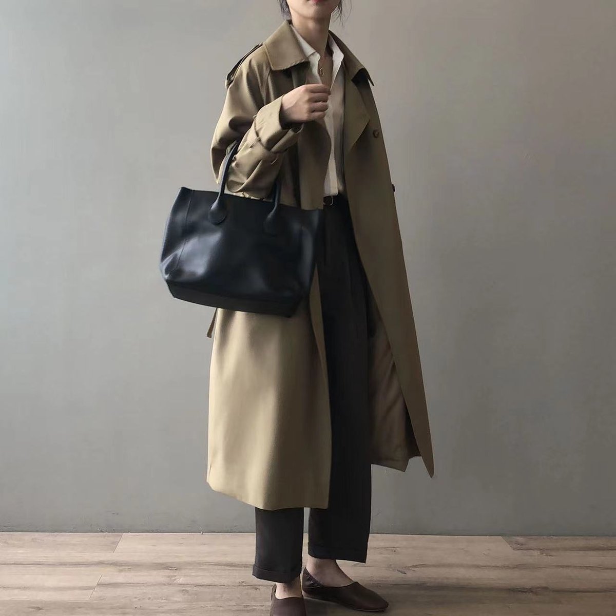Katherine long double-breasted trench coat in khaki, full-length view with black handbag