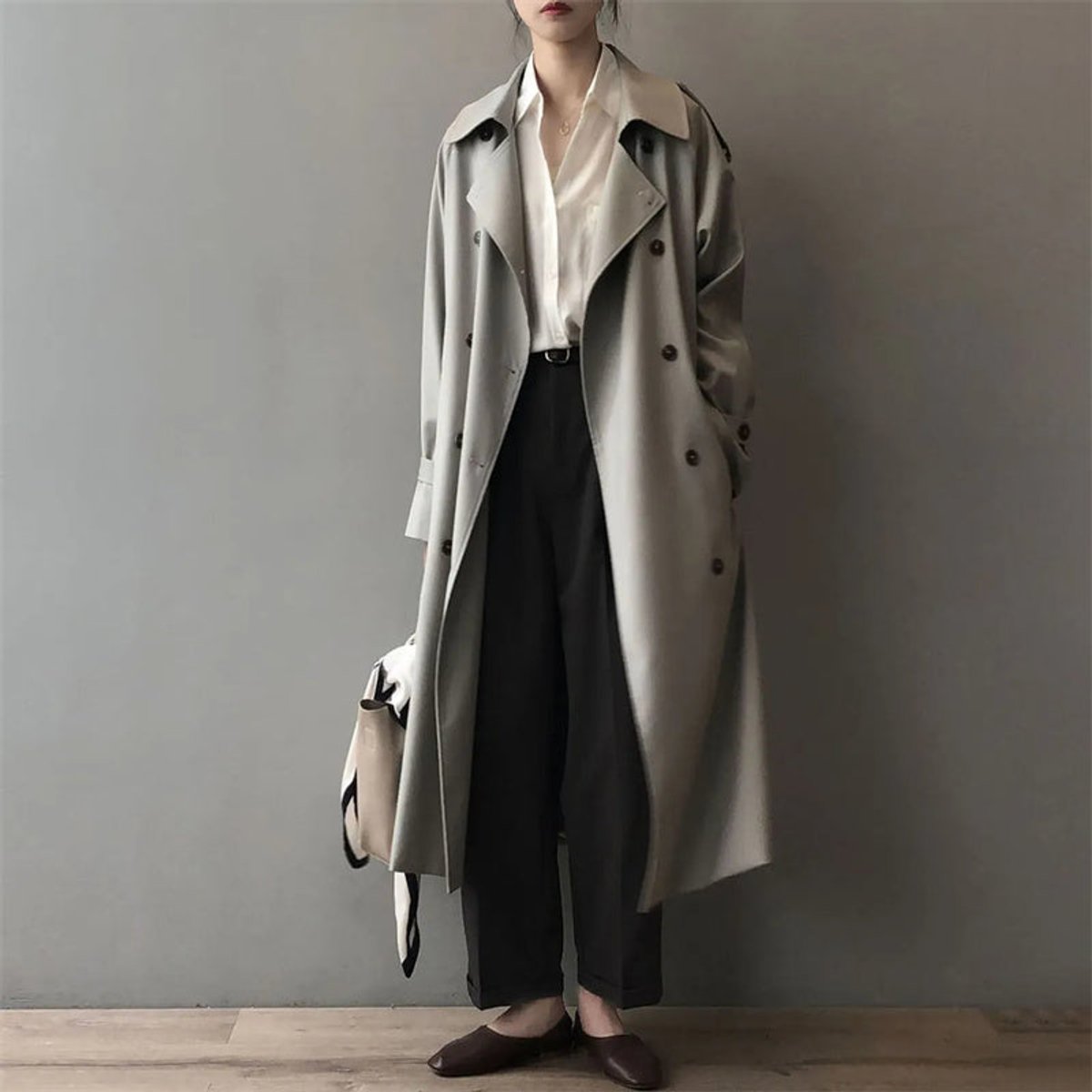 Katherine long double-breasted trench coat in grey, worn open, full-length front view
