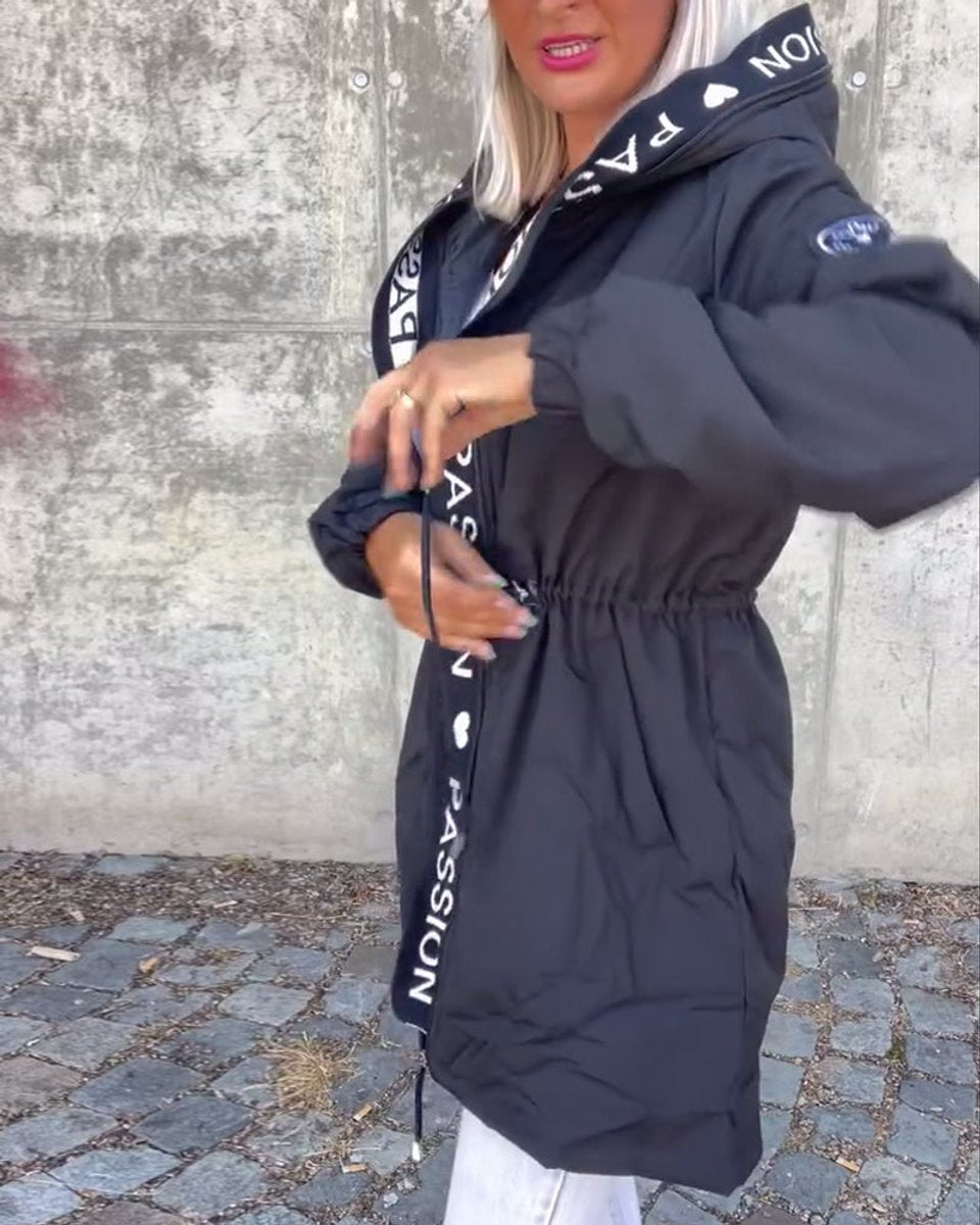 Kitty hooded midi parka in black, side view adjusting the drawstring