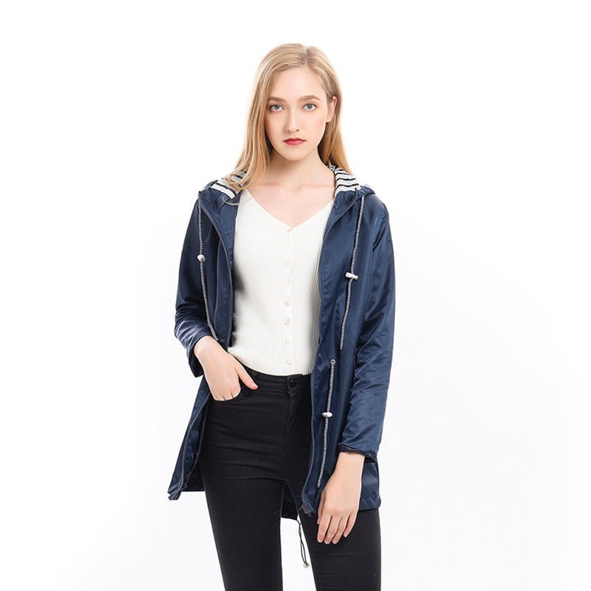 Margaret hooded raincoat in navy blue, worn open on model