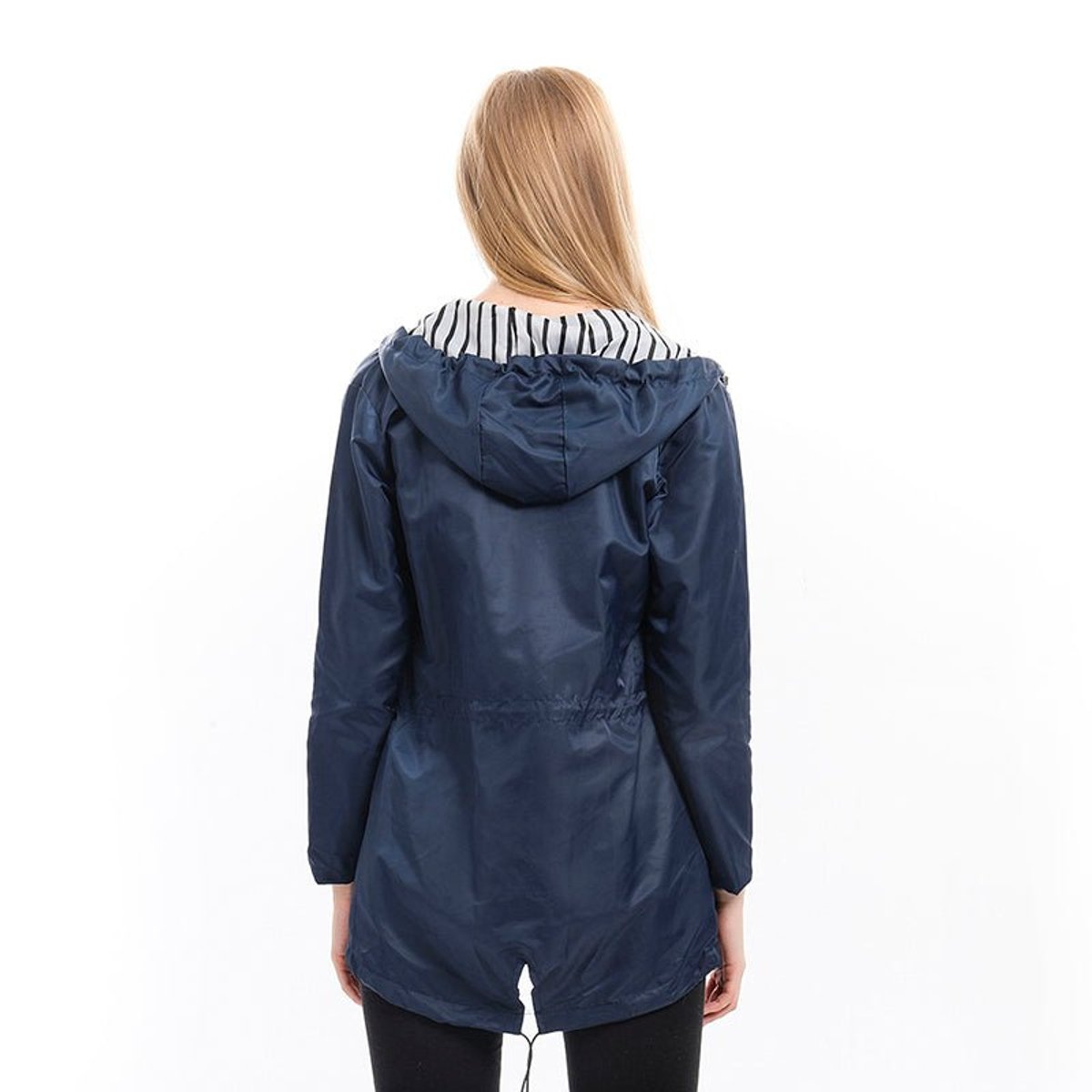 Margaret hooded raincoat in navy blue, back view with hood down