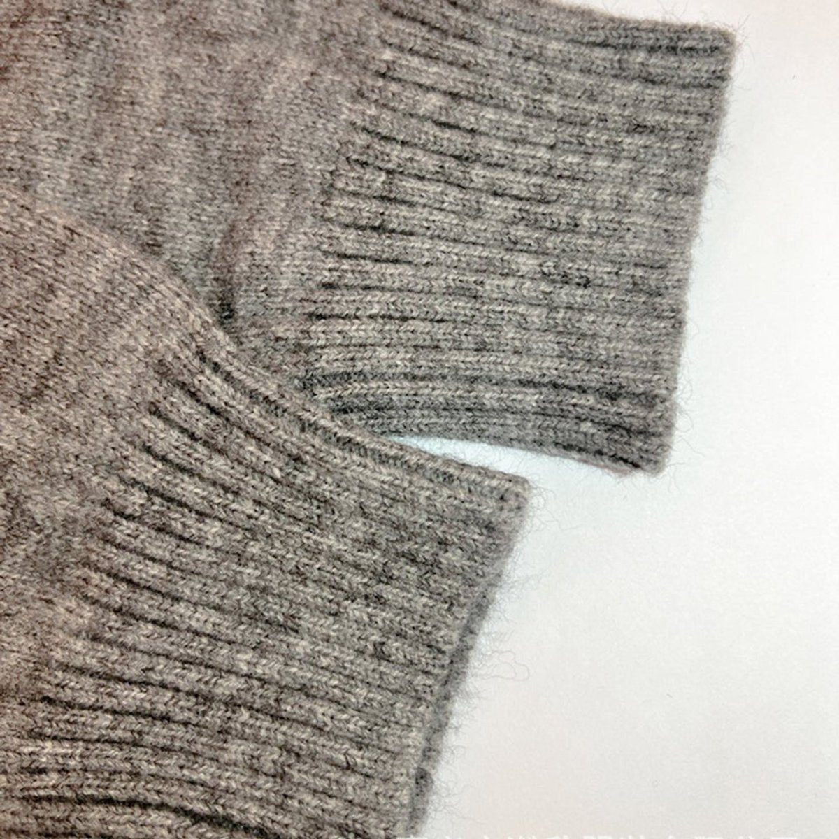 Rosabel hooded open-front cardigan, close-up of ribbed knit cuffs