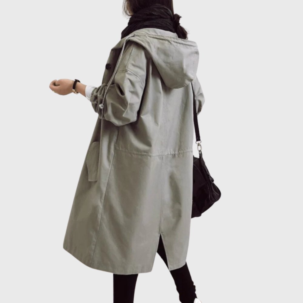 Ruth hooded longline trench coat in grey, side-back view showing hood and back slit