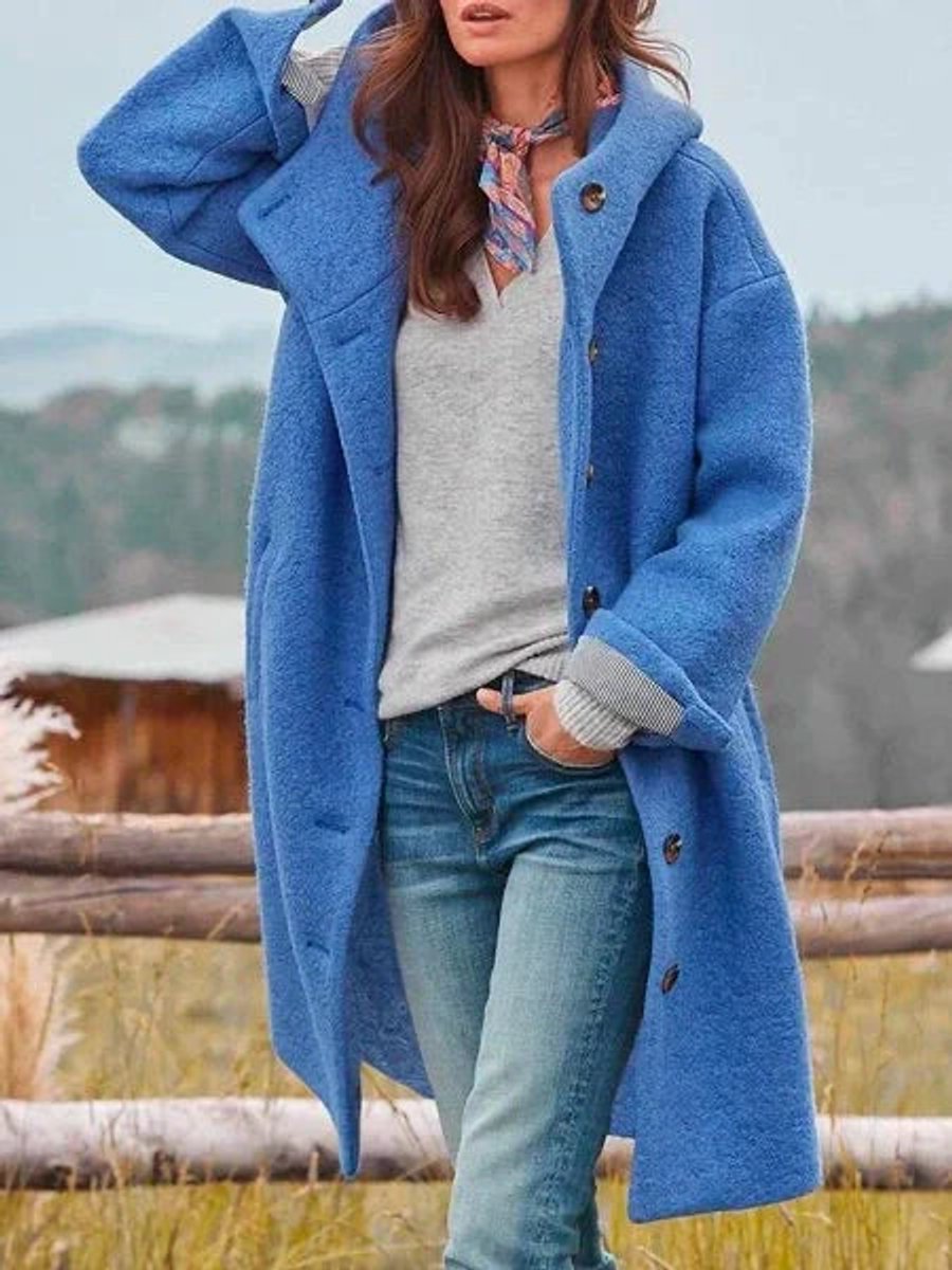 Eleanor long hooded coat in blue, three-quarter front view