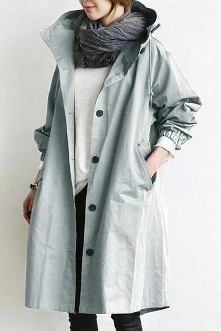 Maisie oversized hooded coat in light blue, front view with hand in pocket