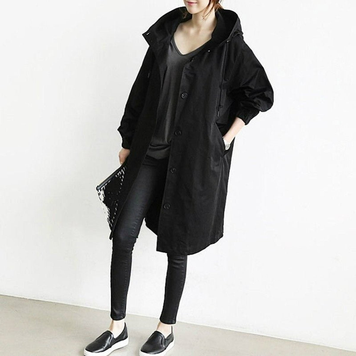 Maisie oversized hooded coat in black, worn open over black jeans