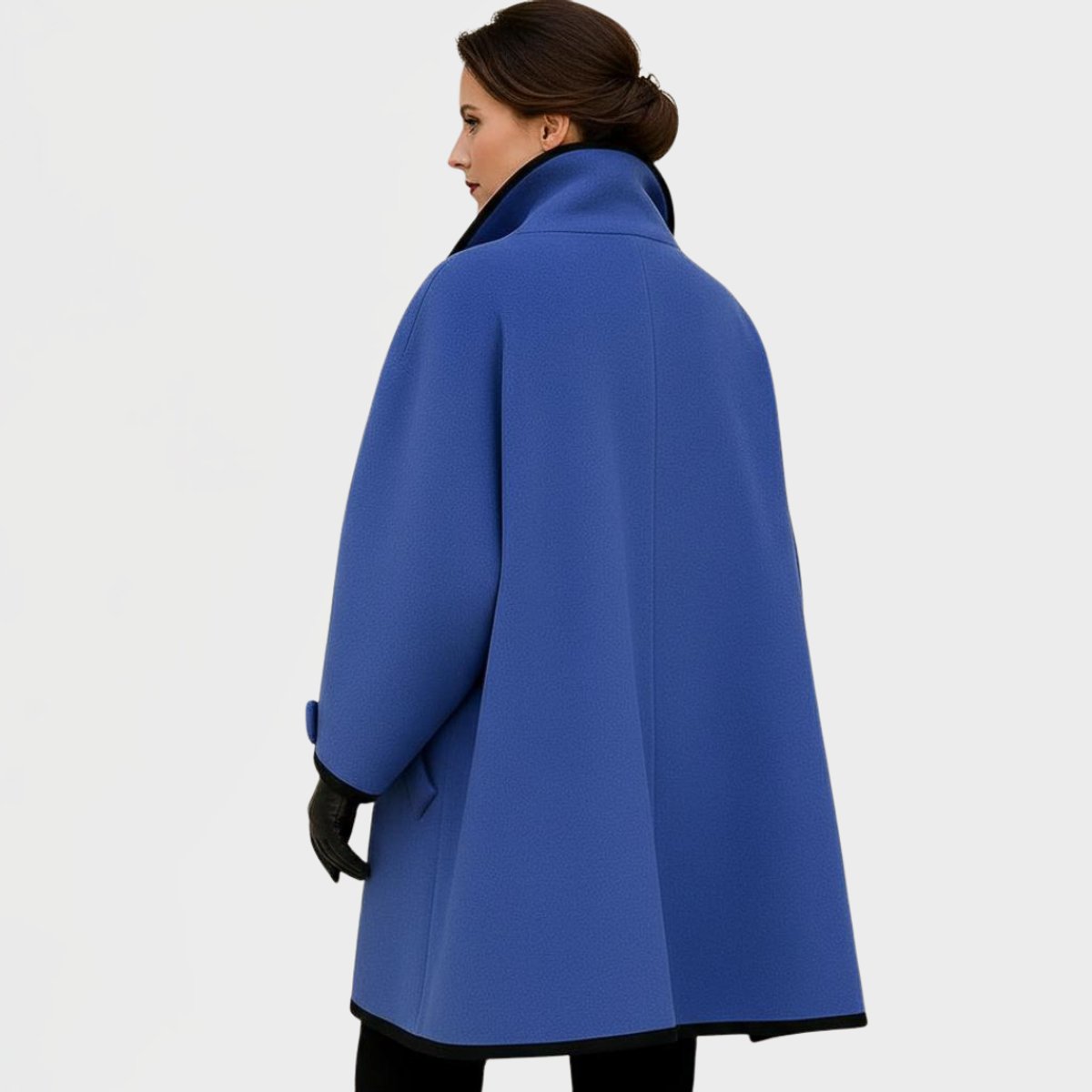 Flora oversized contrast-trim coat in blue, back view of swing silhouette