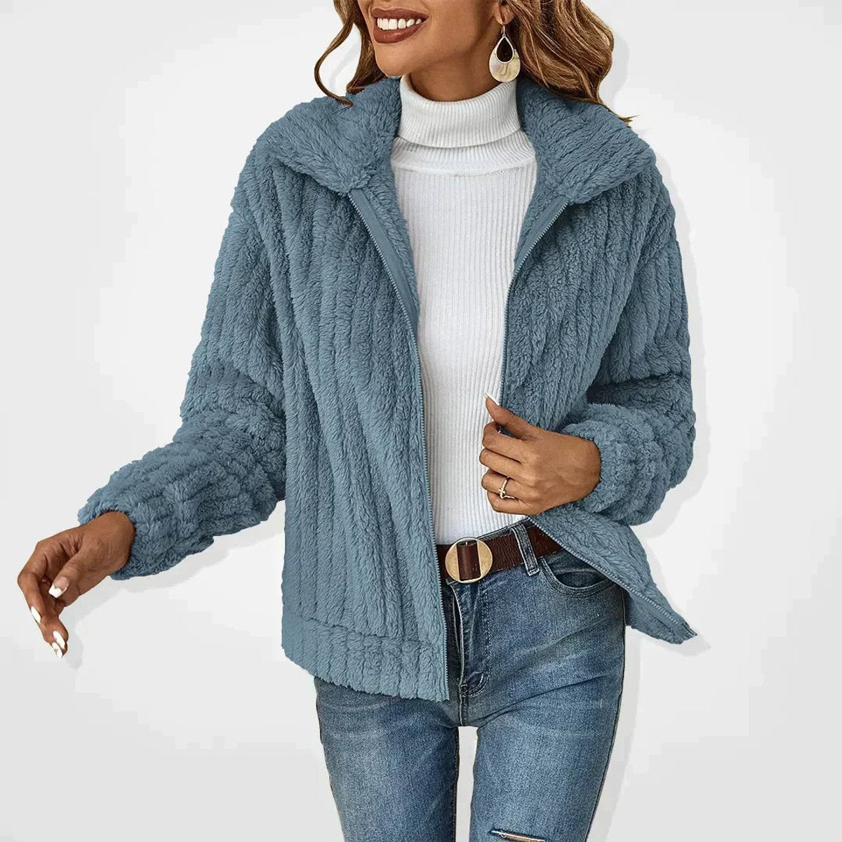 Rita plush zip-up jacket in blue, front view with jeans