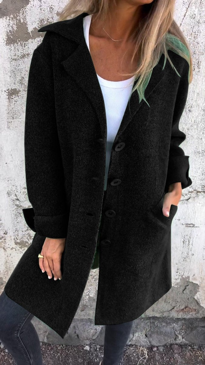 Lucille long lapel coat in black, front view worn open