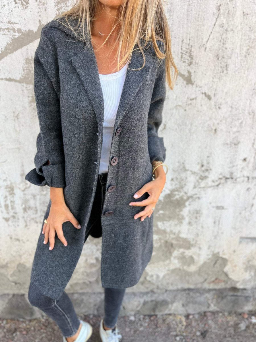 Lucille long lapel coat in grey, front view over jeans