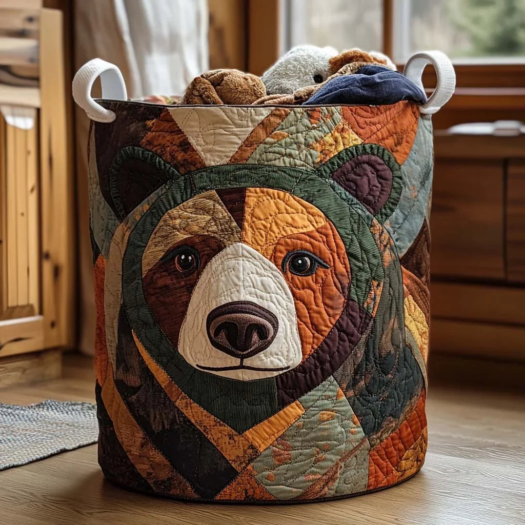 Fabiola hand-quilted laundry basket with a patchwork brown bear face, front view